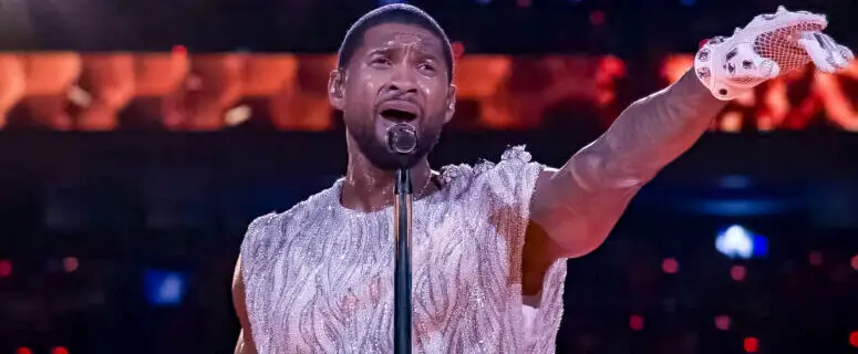 How did Usher celebrate his Super Bowl halftime appearance?